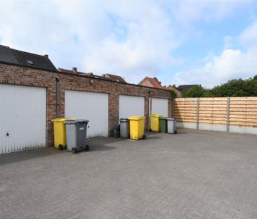 Gelijkvloers appartement met 2 slaapkamers, tuin en garage. - Photo 1