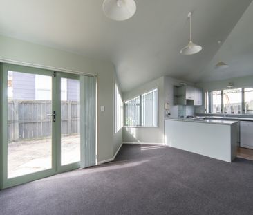 Tucked-Away Comfort: Three Bedroom Home - Photo 2