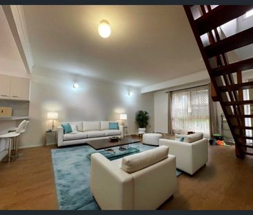 2 Bedroom Townhouse in Highly Desired Location! - Photo 1