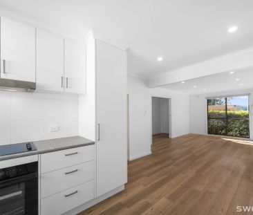 Fully refurbished two bedroom unit, conveniently located - Photo 6