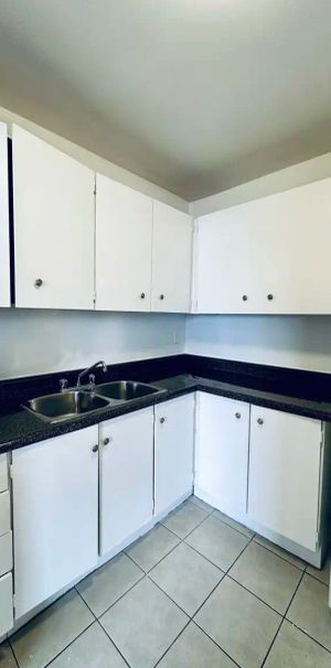 1455 Wilson Avenue — 1 Bedroom - Photo 1