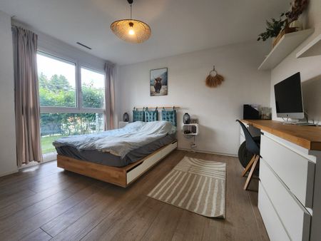 Appartement de 2,5 pièces au rez-de-chaussée avec jardin - Photo 4