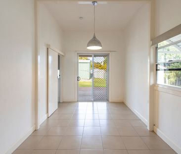 Well-Kept 3-Bedroom Home with Shed & Sunroom in Quiet Location - Photo 4