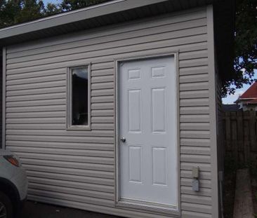 4 1/2 REZ-DE-JARDIN PLAFONDS 9 PIEDS AVEC CABANON - Photo 4