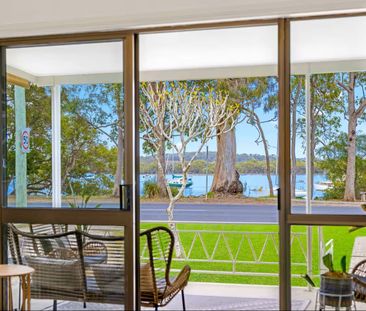 Riverfront living! - Photo 1