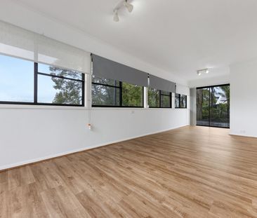 Refurbished Family Home with Huge Rear Yard - Photo 6