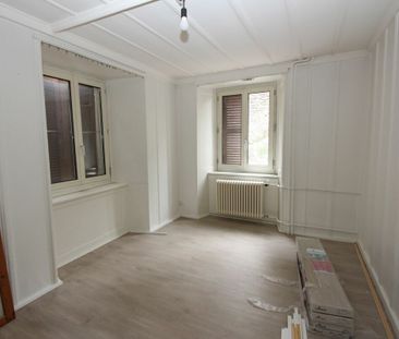 Appartement de 2.5 pièces au rez-de-chaussée - Photo 1