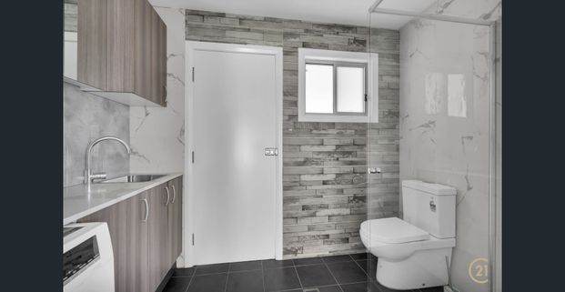 Stylish & Private Granny Flat with Separate Street Access- Walk to Station - Photo 1