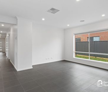 SPACIOUS FOUR-BEDROOM HOME WITH YEAR-ROUND COMFORT - Photo 1