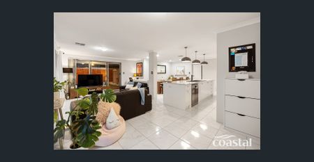 Beautifully Presented Coastal Home with Pool - Photo 4