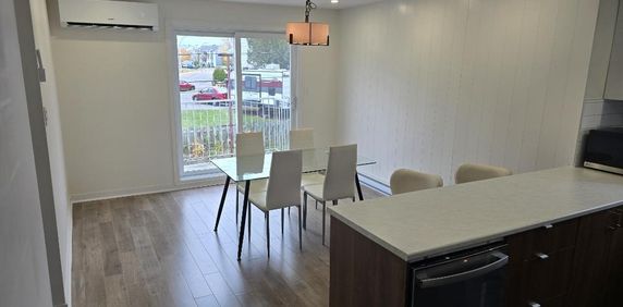 Grand 4 ½ de style condo entièrement rénové – Dernier étage d’un triplex à Sainte-Thérèse ! - Photo 2