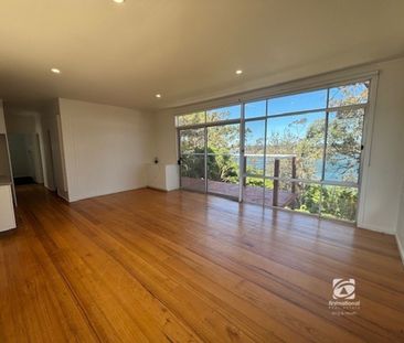 FRESHLY RENOVATED ON THE LAKES EDGE! - Photo 3