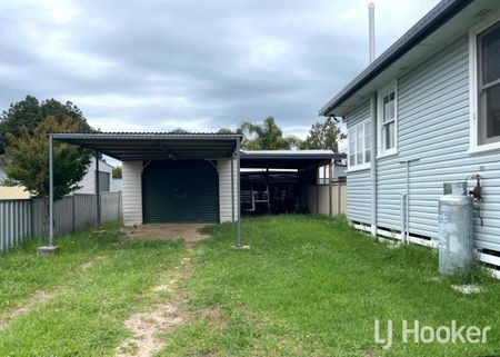 Comfortable Weatherboard Home - Photo 4