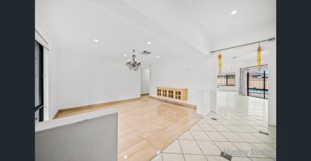 Spacious 4-Bedroom Home with Pool in Prime Location! - Photo 5