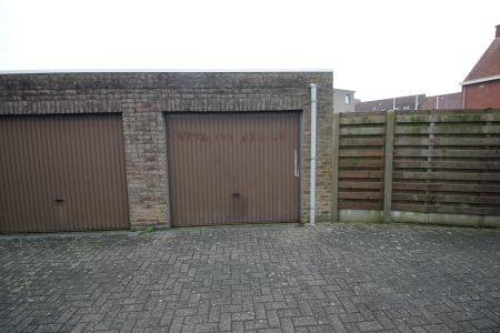 Een gelijkvloers appartement met 2 slaapkamers, tuin en garage. - Photo 4