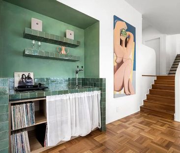 Furnished Coastal Oasis with Panoramic Views and Artistic Flair - Photo 3