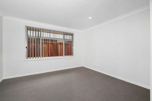 LIGHT-FILLED WITH MULTIPLE LIVING AREAS - Photo 1