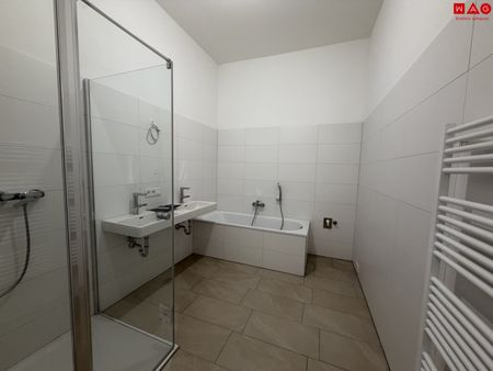 Quartier am Park: Mit modernster Technik ausgestattete Familienwohnung mit 122 m² Eigengarten + 59 m² Terrasse - Foto 4