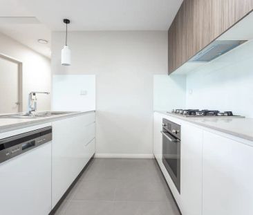 “NEAR NEW MODERN TWO BEDROOM APARTMENT” - Photo 4