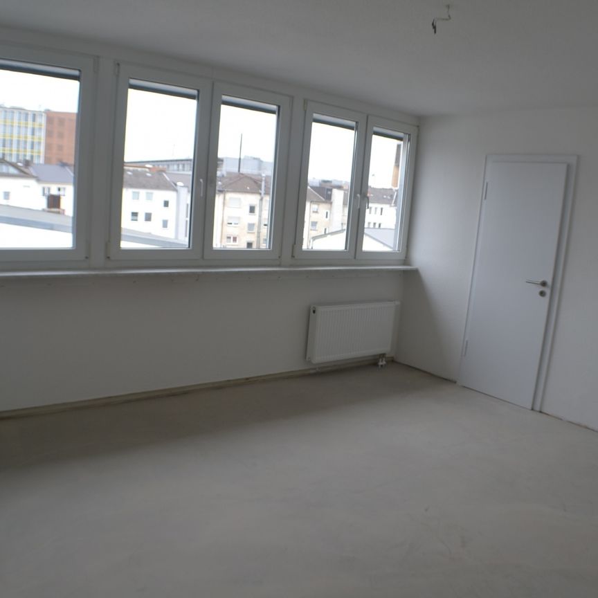 Stadt-Dachgeschosswohnung! - Photo 1