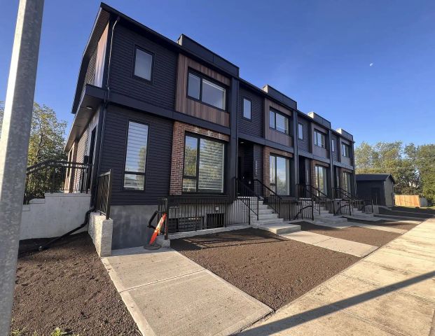 Brand New 3 Bedroom, 2.5 Bath Main Floor — 9406 154 St | $1,990/month — 3 Bedrooms Townhouse - Photo 1