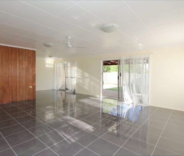 Deceptively Spacious Family Home with Multiple Living Areas - Photo 2