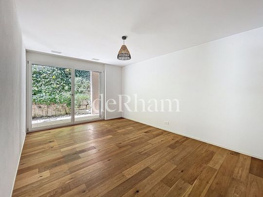 Superb and spacious 4.5-room apartment with garden! - Photo 1