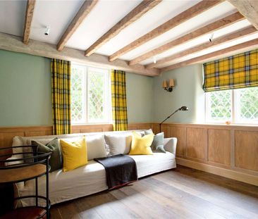 A stunning country retreat situated in the heart of the popular vil... - Photo 2