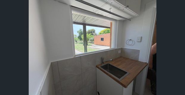 BEAUTIFULLY UPDATED THREE BEDROOM HOME IN HIGHLY SOUGHT AFTER SCHOOL ZONE - Photo 1