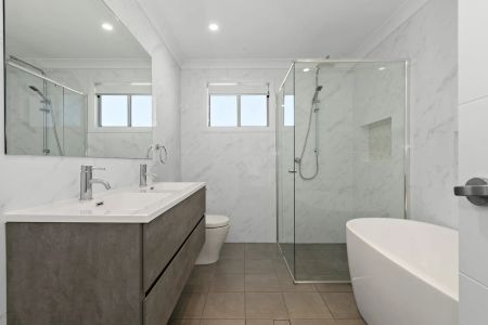 Modern Luxury with Multiple Living Zones & Low-Maintenance Backyard - Photo 4