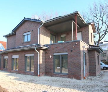 Zwei exklusive Neubau-Erdgeschosswohnungen mit überdachter Terrasse... - Foto 4