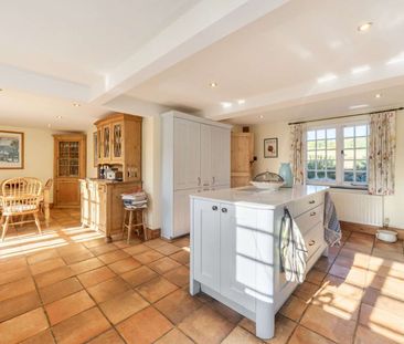 A charming five-bedroom detached family home with a beautiful garden stunning countryside views. - Photo 3
