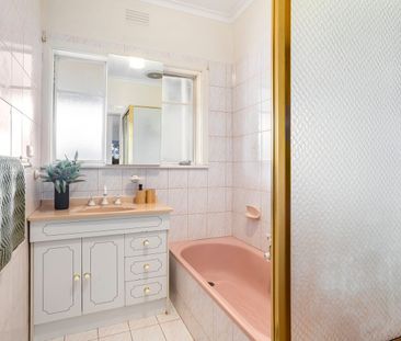 Family Home in Impressive Locale with Spacious Living - Photo 6