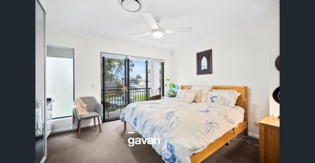 Modern Three-Bedroom Townhouse in a Peaceful Illawong Setting - Photo 5