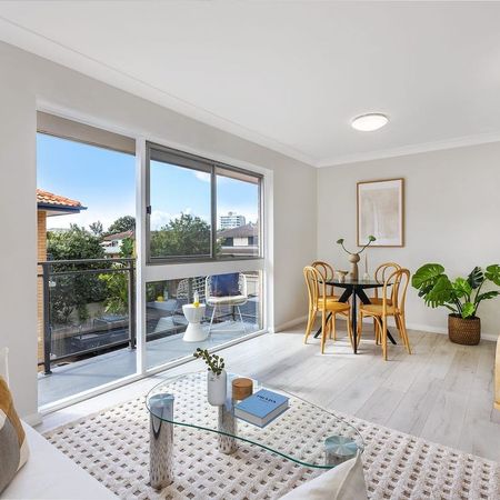 Top Floor Coastal Living with Light, Privacy and Lifestyle Convenience - Photo 3