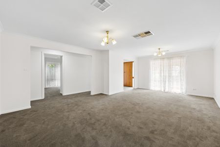 Refreshed Four-Bedroom Home With Gated Side Access - Photo 4