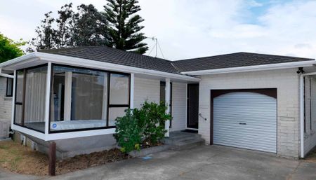 Tidy Two-Bedroom Home with Internal Garage and Charming Bay Window - Photo 2