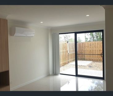 Charming Low-Maintenance Living in Growing Logan Reserve - Photo 1