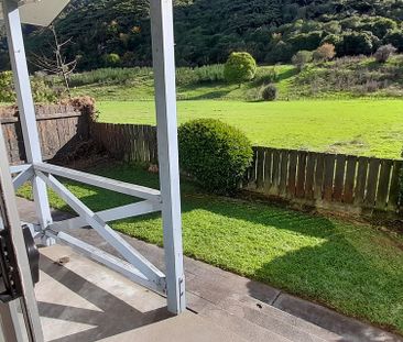 Fully fenced house with a peaceful outlook - Photo 1
