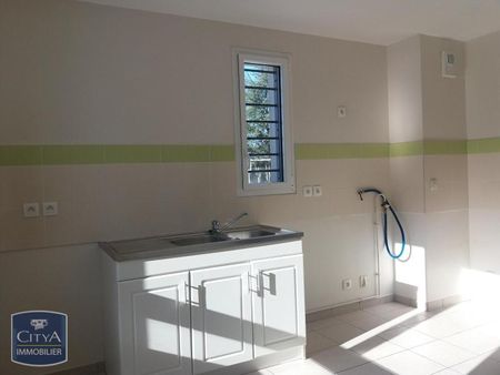 Location Maison 4 pièces 103m² CHATEAUROUX 36000 - Photo 2