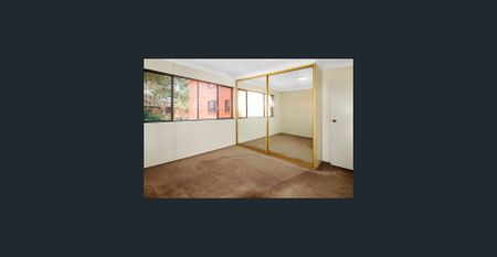 Spacious renovated two bedroom unit in central location - Photo 3