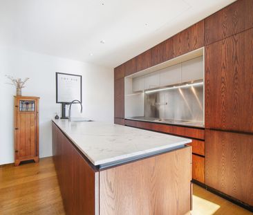 Stylish City-Fringe Apartment with Huge Private Deck - Photo 6