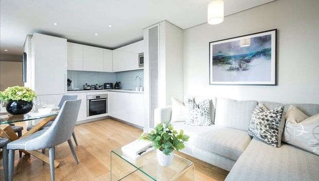 This apartment steals the show with amazing views from its beautiful south-facing Terrace. Along with this comes a stunning, spacious (912sq ft) interior-designed apartment, set within the heart of the Paddington Basin. EPC Rating B | Council Tax Band G - Photo 1