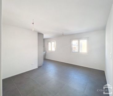 Situé à 3 minutes à pied de la gare, appartement de 2,5 pièces rénové - Photo 1