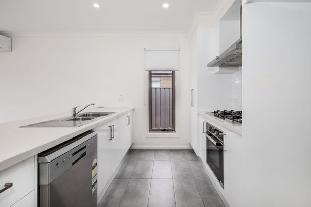 Sleek Style Meets Space: Contemporary Four-Bedroom Home in Highly Sought-After Weir Views - Photo 1