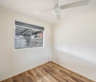 Comfortable Family Home in Great Location - Photo 1
