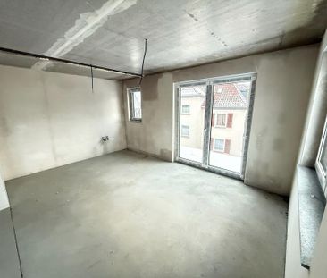 Neubau-Erstbezug: 62m2 2-ZKB mit Balkon & E-Ladeplatz - Photo 4