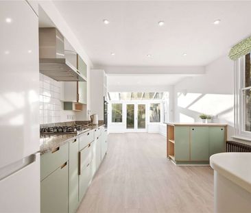 A lovely family home with grand proportions and a wider than averag... - Photo 6