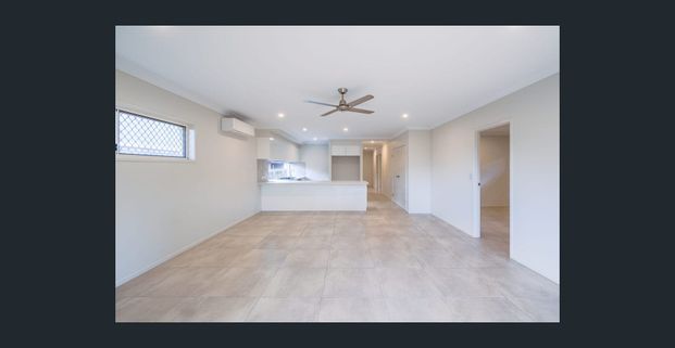 LOW MAINTENANCE FAMILY HOME, READY TO MOVE IN AND ENJOY A RELAXED LIFESTYLE! - Photo 1