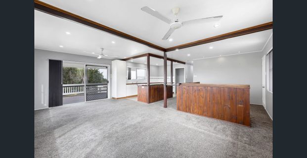 ROOM TO MOVE & VIEWS TO LOVE - FAMILY HOME IN MACKAY! - Photo 1